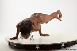 Underwear Gymnastic poses Man Black Athletic Black Dancing Dreadlocks Dynamic poses Academic